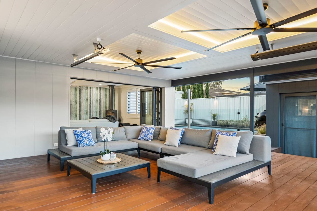 Modern outdoor entertaining area with integrated ceiling fan lighting — NS Electrics