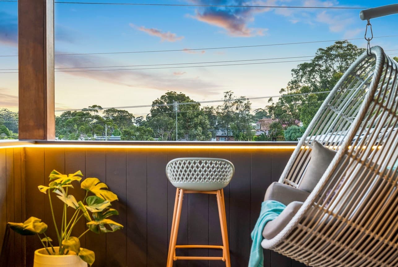 Balcony terrace with LED accent railing lighting at sunset