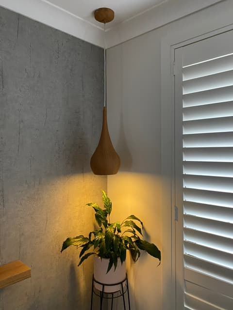 Pendant light installation with warm accent lighting